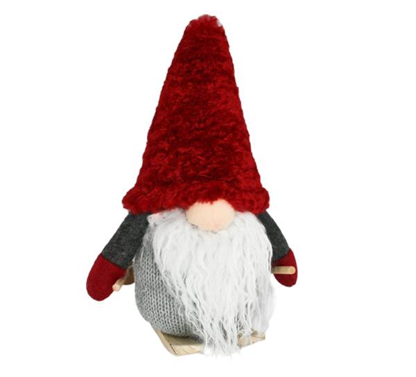 Bilde av Nisse på ski med rød lue