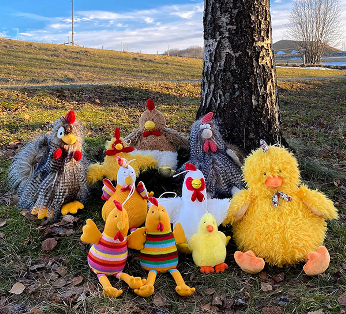 Knitted hen with pink striped legs
