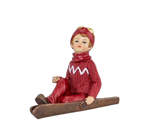 Main Image Boy with skis, sitting